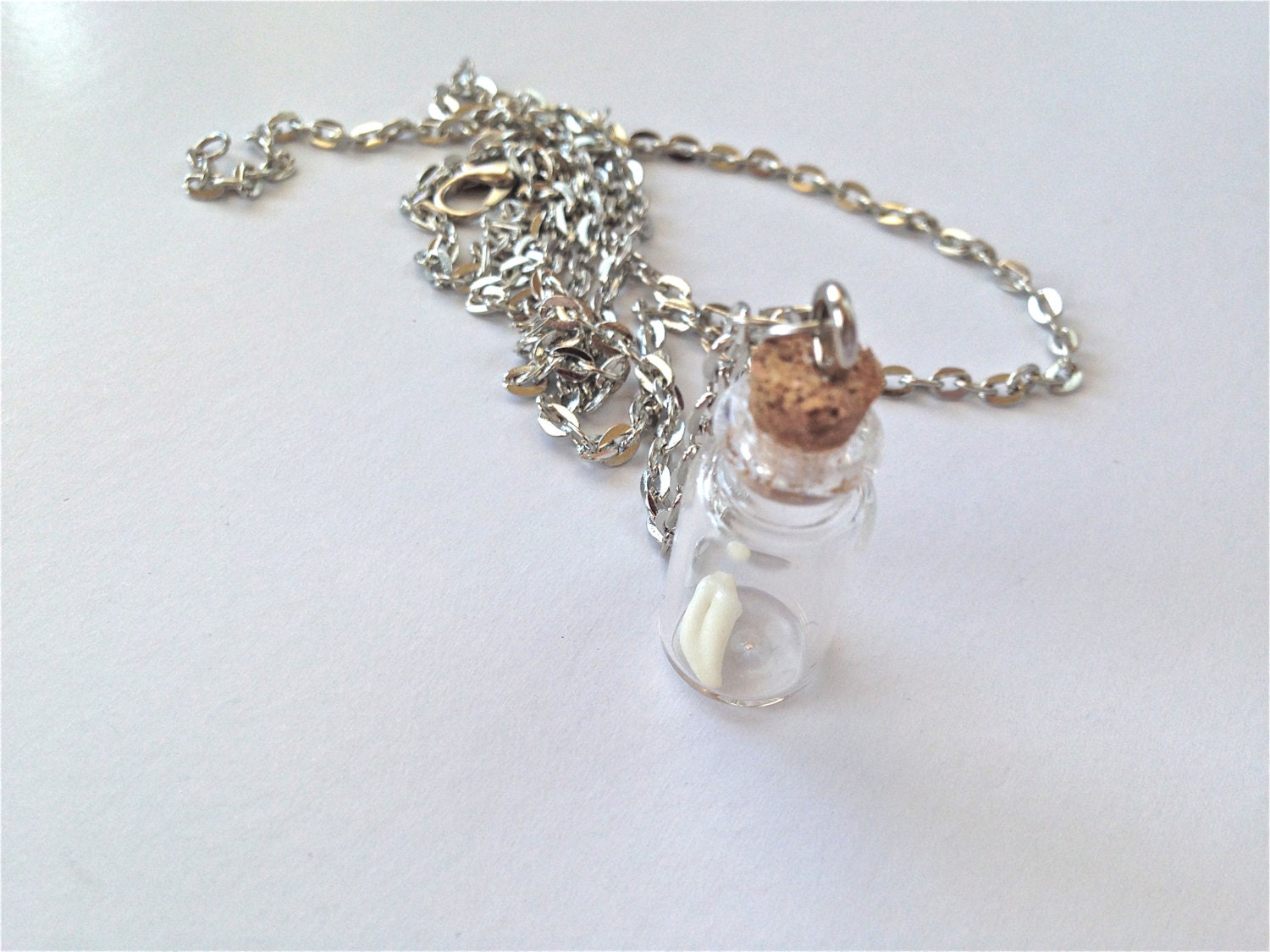 Animal claw glass jar necklace