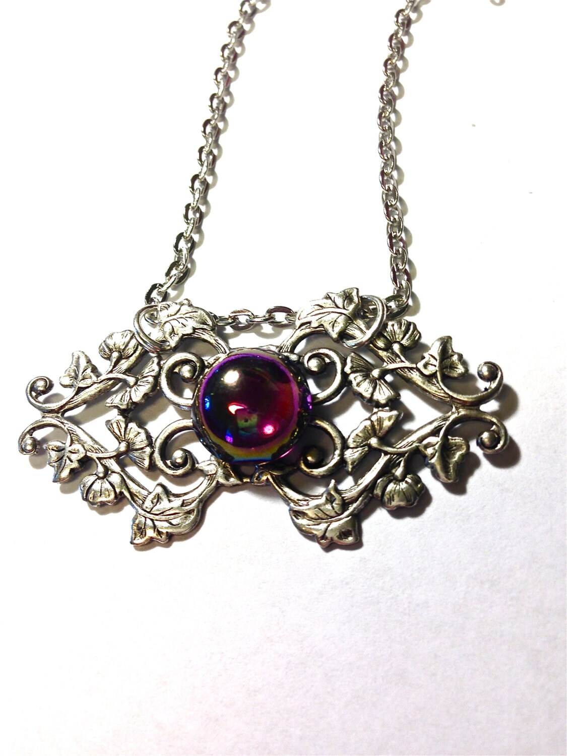 Rainbow antique silver toned filigree stamping necklace