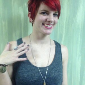 Glass vial of bones necklace