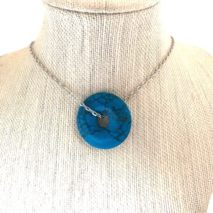 Light blue howlite donut pi stone necklace