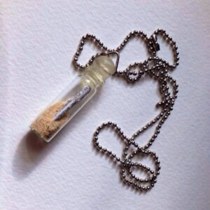 Sand and map vile necklace